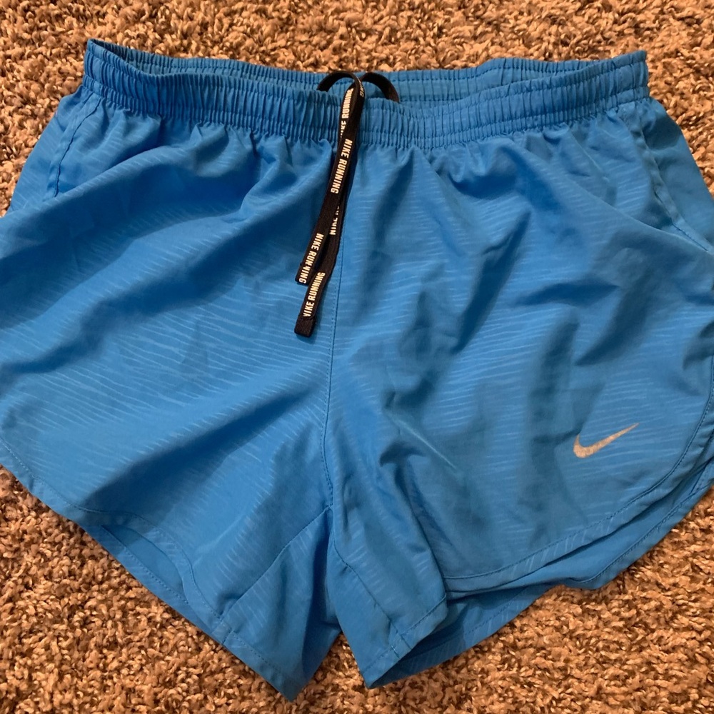 Blue Nike dri fir running shorts